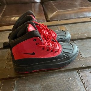 Red and black nike boots